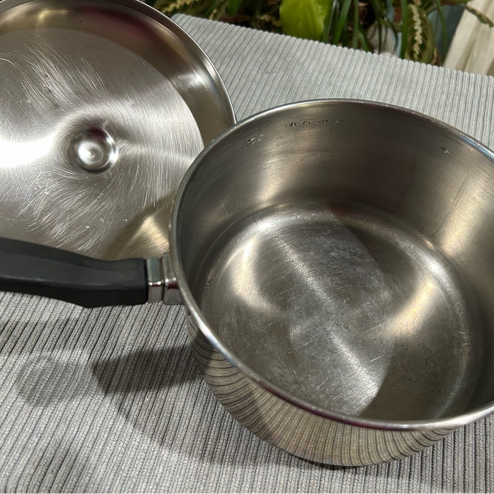 Farberware Silver Saucepan with Black Handle
Sizes:  1 quart & 2 quart - Picture 3 of 11